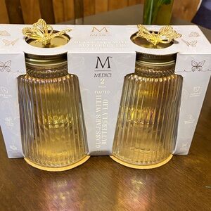 NWT. Medici Gold Fluted Glass Jars with Butterfly Lid